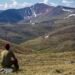 traveler hiking backpack mountain