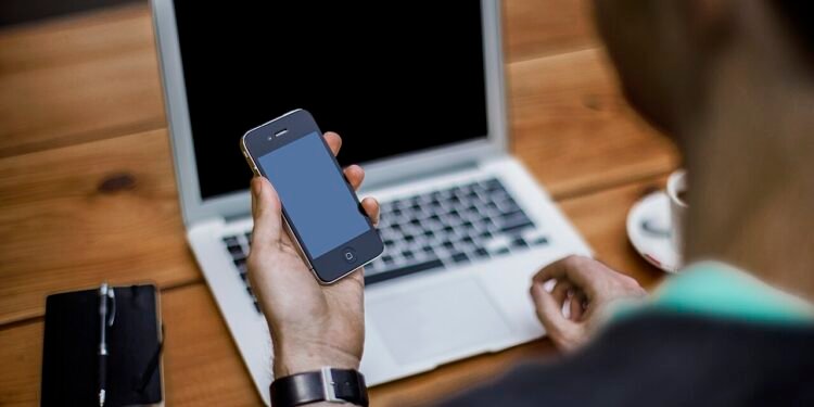laptop smartphone desk technology