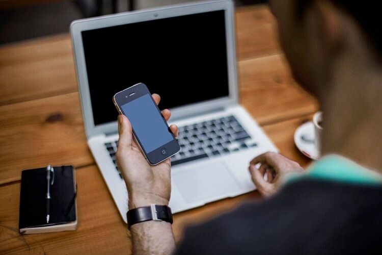 laptop smartphone desk technology